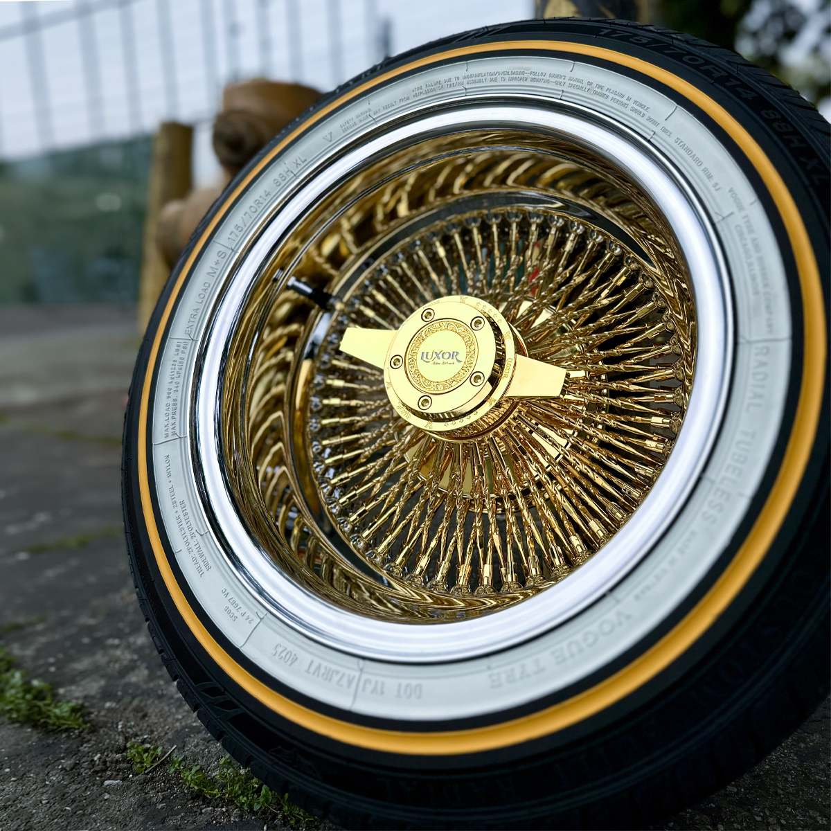 14x7” Luxor Wire Wheels – Gold Center Reverse 100 Spoke (Diamond Cut) + 175/70R14 Original Vogue Tires | Set of 4